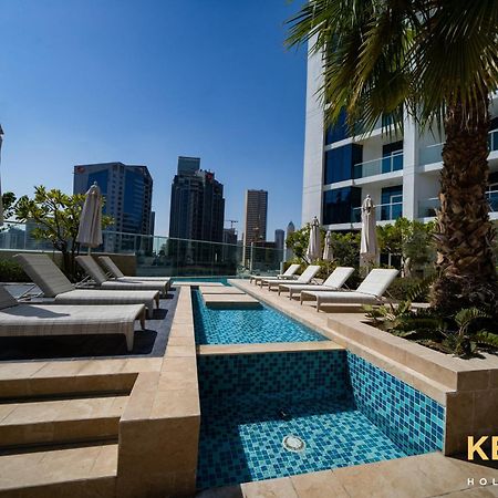 Sleek Studio In Prive With Stunning Canal View Дубай Екстериор снимка